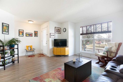 211 Prestwick Heights Se, Calgary, AB - Indoor Photo Showing Living Room