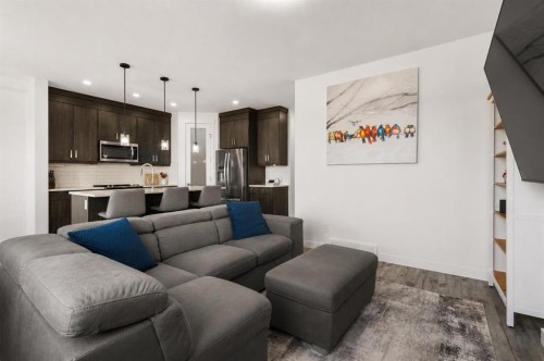 1041 Iron Landing Way, Crossfield, AB - Indoor Photo Showing Living Room