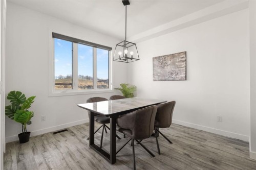 1041 Iron Landing Way, Crossfield, AB - Indoor Photo Showing Dining Room