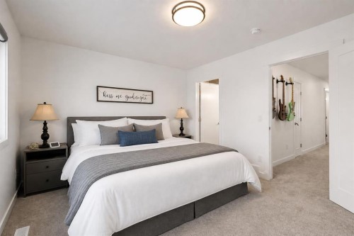 1041 Iron Landing Way, Crossfield, AB - Indoor Photo Showing Bedroom