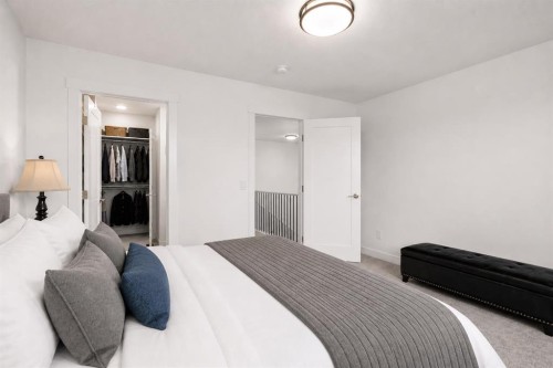 1041 Iron Landing Way, Crossfield, AB - Indoor Photo Showing Bedroom