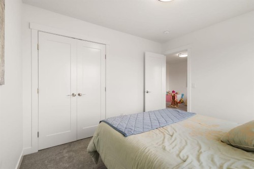 1041 Iron Landing Way, Crossfield, AB - Indoor Photo Showing Bedroom