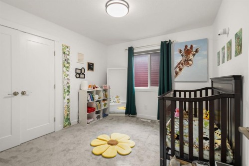 1041 Iron Landing Way, Crossfield, AB - Indoor Photo Showing Bedroom
