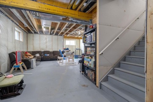 1041 Iron Landing Way, Crossfield, AB - Indoor Photo Showing Basement