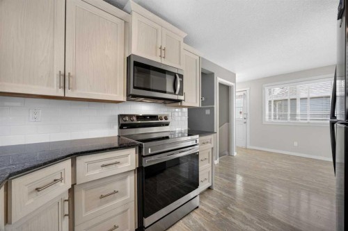 84 Macewan Glen Way Nw, Calgary, AB - Indoor Photo Showing Kitchen