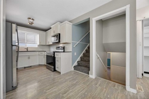 84 Macewan Glen Way Nw, Calgary, AB - Indoor Photo Showing Kitchen
