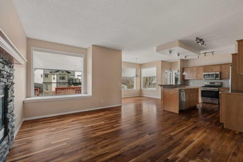 11 Valley Crest Rise Nw, Calgary, AB - Indoor Photo Showing Other Room With Fireplace