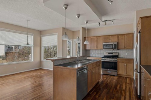11 Valley Crest Rise Nw, Calgary, AB - Indoor Photo Showing Kitchen With Double Sink