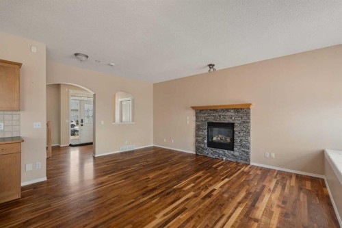 11 Valley Crest Rise Nw, Calgary, AB - Indoor Photo Showing Living Room With Fireplace