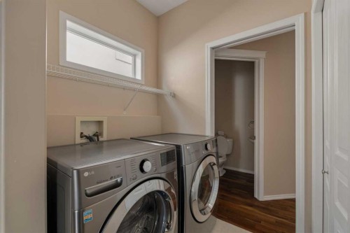 11 Valley Crest Rise Nw, Calgary, AB - Indoor Photo Showing Laundry Room