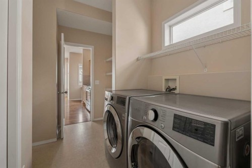 11 Valley Crest Rise Nw, Calgary, AB - Indoor Photo Showing Laundry Room