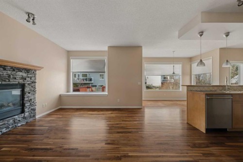 11 Valley Crest Rise Nw, Calgary, AB - Indoor Photo Showing Living Room With Fireplace
