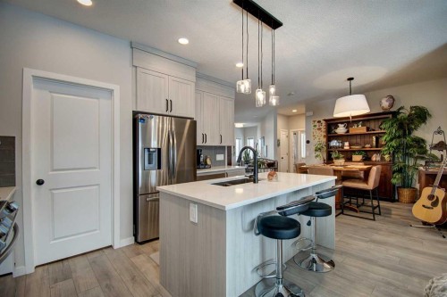 800 Mandalay Link, Carstairs, AB - Indoor Photo Showing Kitchen With Double Sink With Upgraded Kitchen