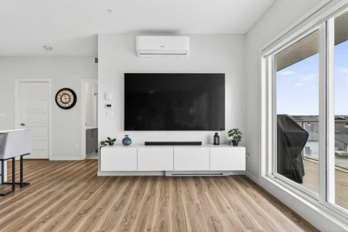 2313-220 Seton Grove Se, Calgary, AB - Indoor Photo Showing Living Room