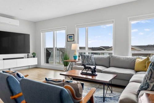 2313-220 Seton Grove Se, Calgary, AB - Indoor Photo Showing Living Room