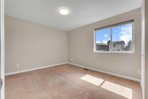 61 Martindale Boulevard Ne, Calgary, AB - Indoor Photo Showing Other Room