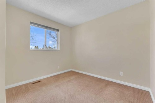 61 Martindale Boulevard Ne, Calgary, AB - Indoor Photo Showing Other Room