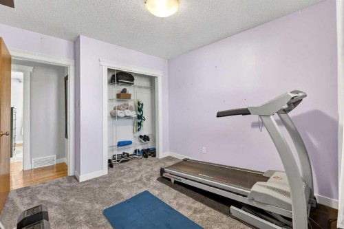 316 Wascana Crescent Se, Calgary, AB - Indoor Photo Showing Gym Room