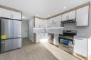 4249 Catalina Boulevard Ne, Calgary, AB  - Indoor Photo Showing Kitchen With Stainless Steel Kitchen With Upgraded Kitchen 