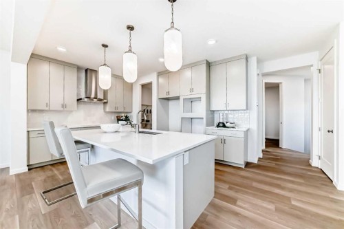 64 Creekside Path Sw, Calgary, AB - Indoor Photo Showing Kitchen With Upgraded Kitchen