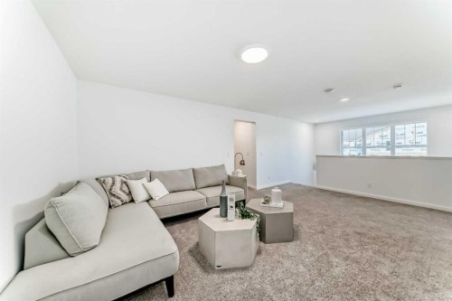 64 Creekside Path Sw, Calgary, AB - Indoor Photo Showing Living Room