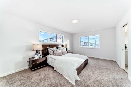 64 Creekside Path Sw, Calgary, AB - Indoor Photo Showing Bedroom