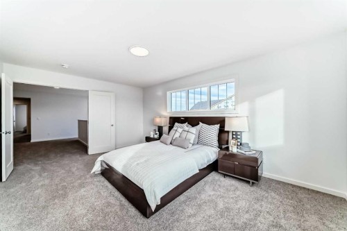 64 Creekside Path Sw, Calgary, AB - Indoor Photo Showing Bedroom