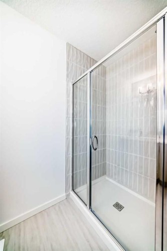64 Creekside Path Sw, Calgary, AB - Indoor Photo Showing Bathroom