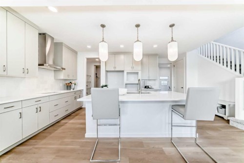 64 Creekside Path Sw, Calgary, AB - Indoor Photo Showing Kitchen With Upgraded Kitchen