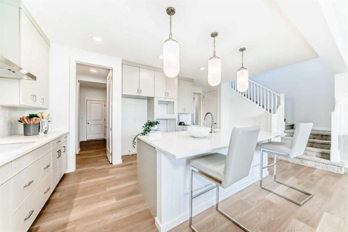 64 Creekside Path Sw, Calgary, AB - Indoor Photo Showing Kitchen With Upgraded Kitchen