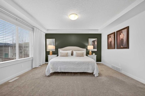 19 Cranbrook Crescent Se, Calgary, AB - Indoor Photo Showing Bedroom