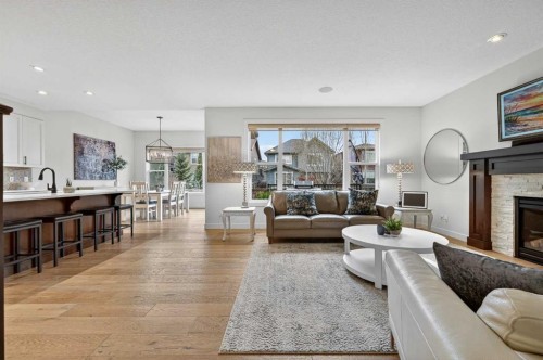 19 Cranbrook Crescent Se, Calgary, AB - Indoor Photo Showing Living Room With Fireplace