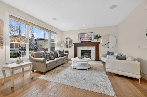 19 Cranbrook Crescent Se, Calgary, AB - Indoor Photo Showing Living Room With Fireplace