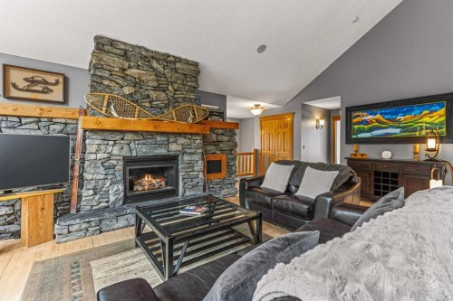 116 Casale Place, Canmore, AB - Indoor Photo Showing Living Room With Fireplace