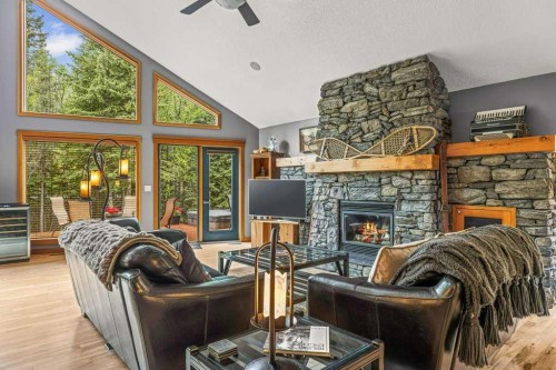 116 Casale Place, Canmore, AB - Indoor Photo Showing Living Room With Fireplace