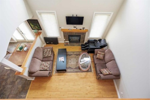 280135 Township Road 242 Se, Chestermere, AB - Indoor With Fireplace