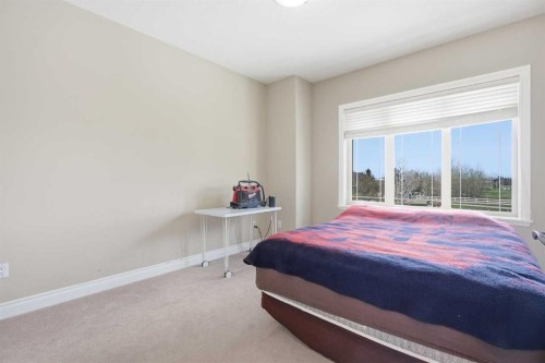 280135 Township Road 242 Se, Chestermere, AB - Indoor Photo Showing Bedroom