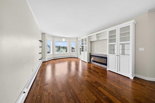 3402-3402 Hawksbrow Point Nw, Calgary, AB - Indoor With Fireplace