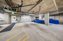 3402-3402 Hawksbrow Point Nw, Calgary, AB  - Indoor Photo Showing Garage 