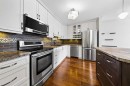 3402-3402 Hawksbrow Point Nw, Calgary, AB  - Indoor Photo Showing Kitchen With Upgraded Kitchen 