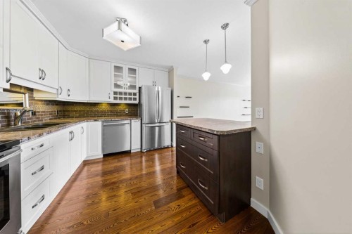 3402-3402 Hawksbrow Point Nw, Calgary, AB - Indoor Photo Showing Kitchen