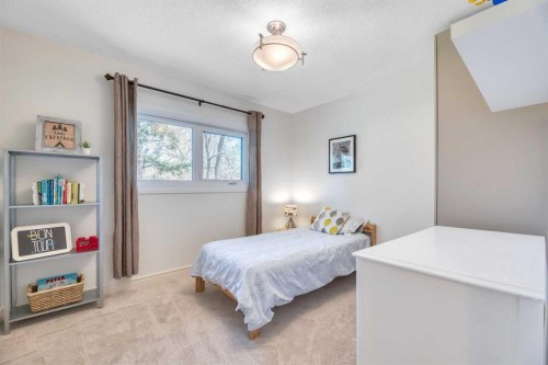 48 Waterloo Drive Sw, Calgary, AB - Indoor Photo Showing Bedroom