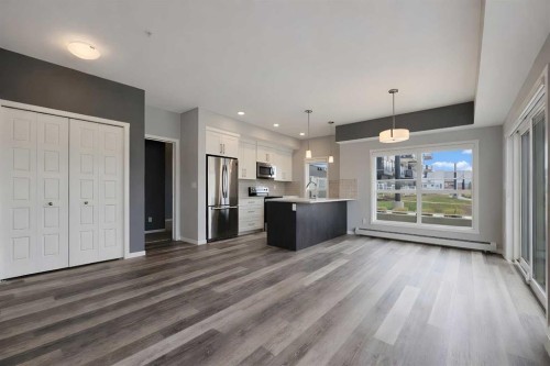109-4150 Seton Drive Se, Calgary, AB - Indoor Photo Showing Kitchen