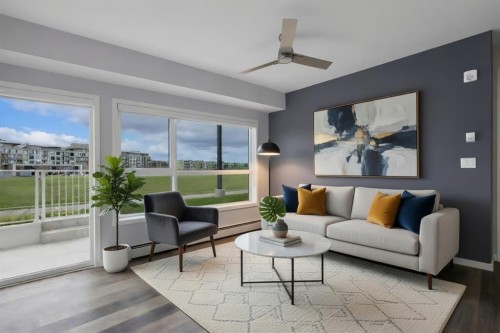 109-4150 Seton Drive Se, Calgary, AB - Indoor Photo Showing Living Room