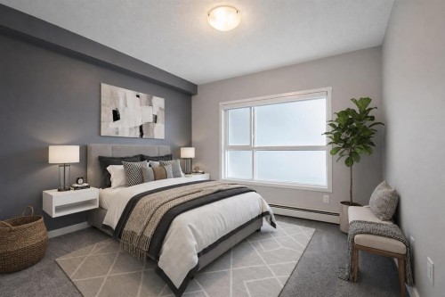 109-4150 Seton Drive Se, Calgary, AB - Indoor Photo Showing Bedroom