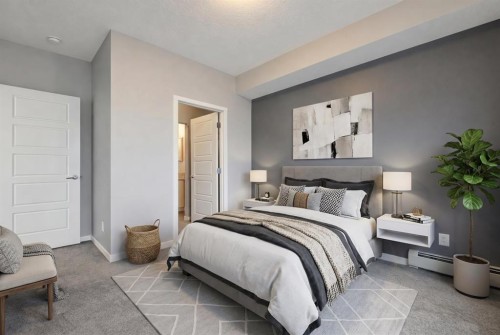 109-4150 Seton Drive Se, Calgary, AB - Indoor Photo Showing Bedroom