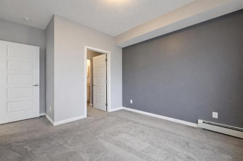 109-4150 Seton Drive Se, Calgary, AB - Indoor Photo Showing Other Room