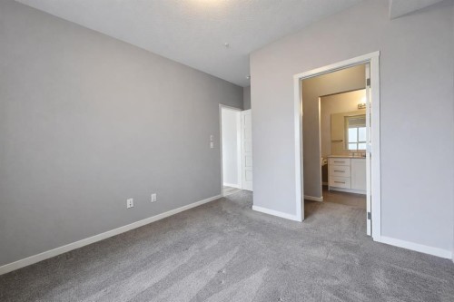 109-4150 Seton Drive Se, Calgary, AB - Indoor Photo Showing Other Room