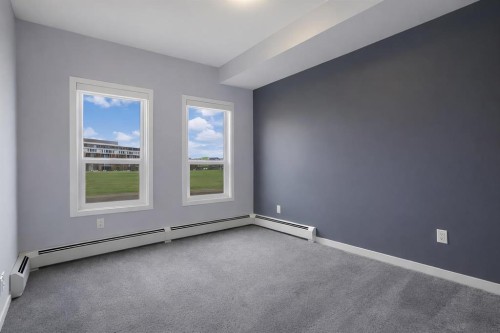 109-4150 Seton Drive Se, Calgary, AB - Indoor Photo Showing Other Room