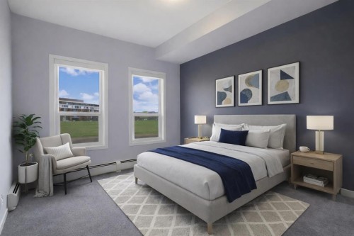109-4150 Seton Drive Se, Calgary, AB - Indoor Photo Showing Bedroom